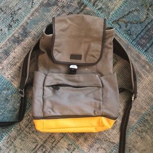 COACH slim canvas backpack in tan/yellow